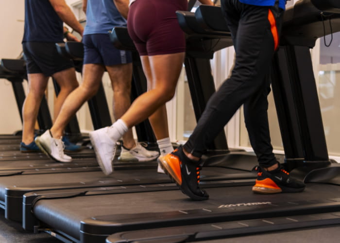 Close up of runners legs on the treadmill